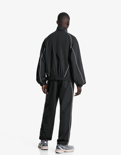 Bershka Technical baggy sports trousers in black ASOS