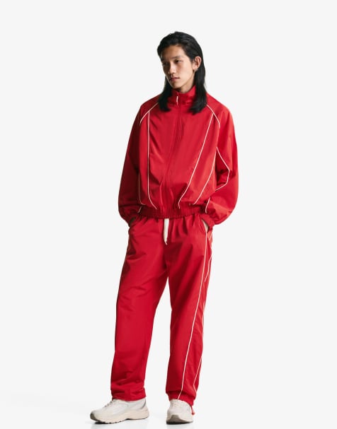 Bershka Technical baggy sports trousers in red - view 1