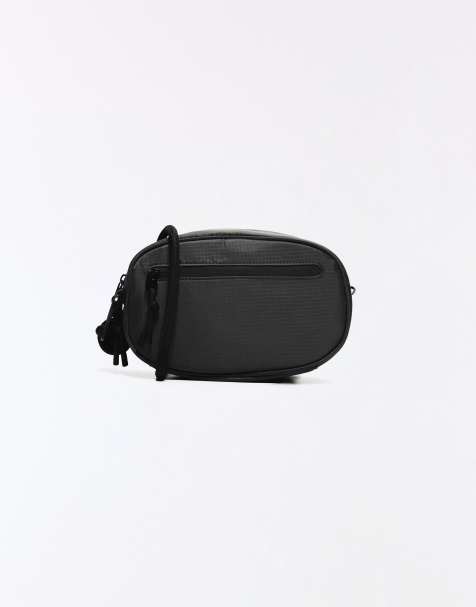 Bershka Technical crossbody bag in black - view 1