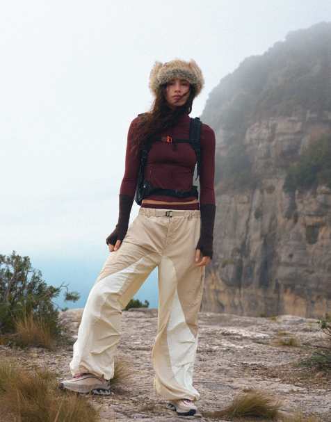 Bershka Technical nylon trousers in ecru - view 1