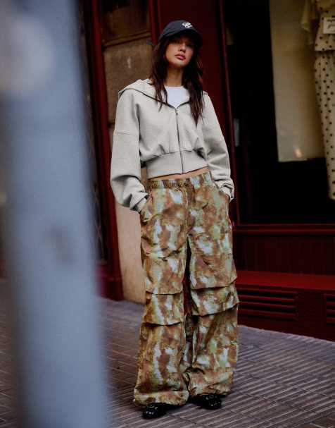 Bershka Technical print parachute trousers in brown - view 1