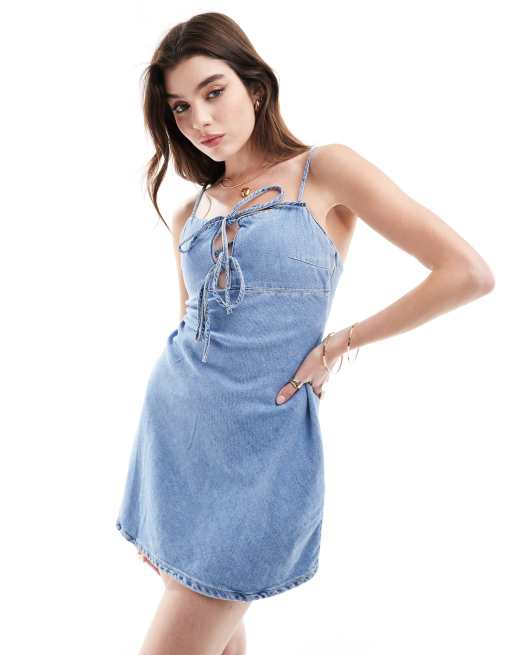 Bershka tie front denim mini dress in blue wash | ASOS