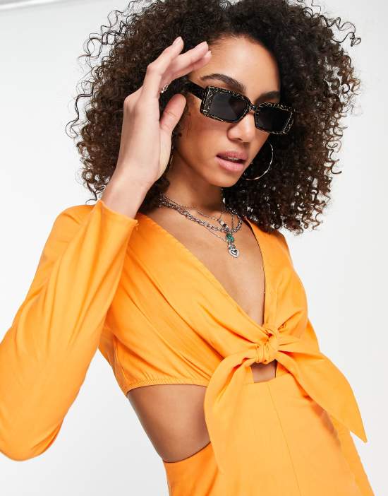 https://images.asos-media.com/products/bershka-tie-up-cut-out-detail-romper-in-orange/202789139-3?$n_550w$&wid=550&fit=constrain