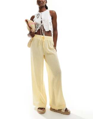 Bershka tie waist seersucker wide leg trousers in butter stripe-Yellow φωτογραφία