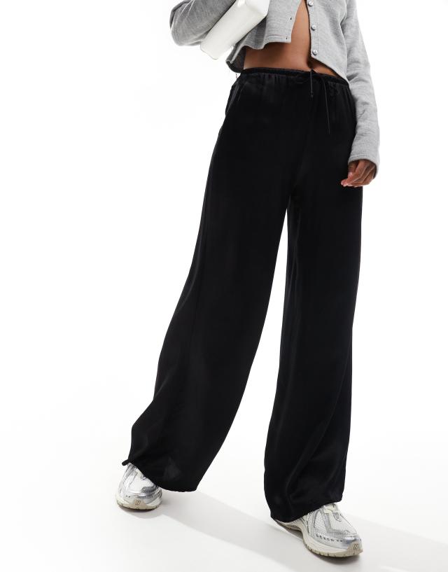 Bershka - tie waist wide leg satin trousers in black