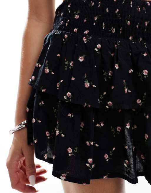Bershka tiered mini rara skirt in black floral | ASOS