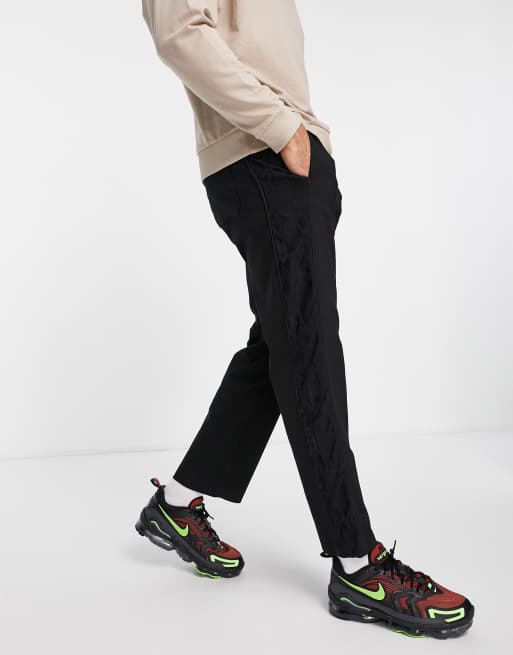 Bershka tracksuit pants in black snake print (part of a set)