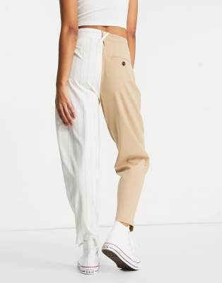 Bershka - Tweekleurige broek met ongelijke taille in camel en wit | ASOS