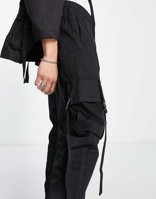 Bershka utility cargo pants with pockets in black