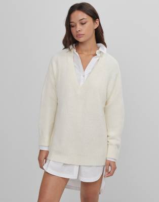 white fluffy sweater