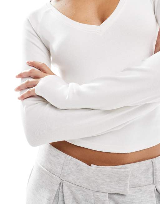 Bershka v-neck long sleeve top in ecru | ASOS