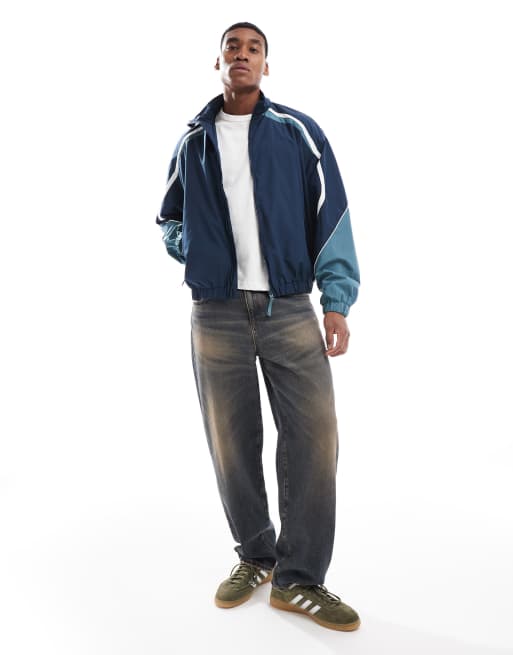 Bershka - Veste de survêtement à empiècements - Bleu