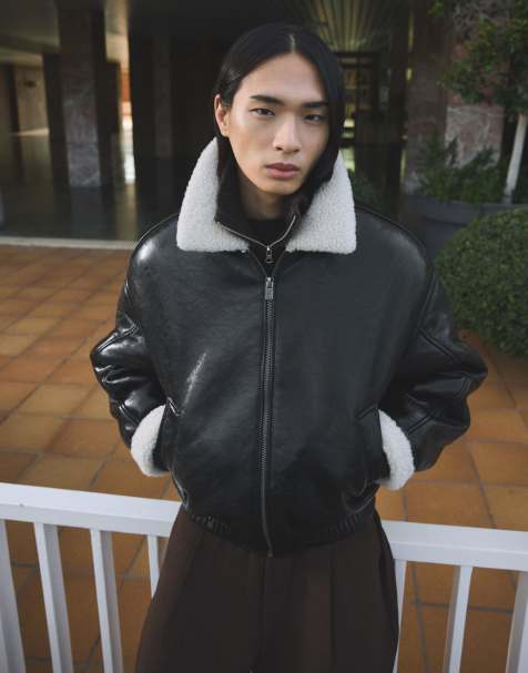 Bershka Vinyl effect jacket with fur collar in black - view 1