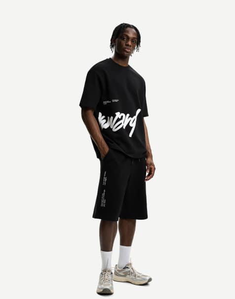 Bershka – Weiche Bermuda-Shorts in Schwarz mit Print - view 1