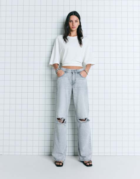 Bershka – Weite Jeans in Grau mit Zierrissen - view 1