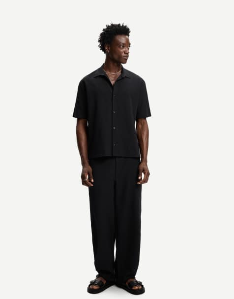 Bershka – Weite Jogginghose in Schwarz mit Bundfalten - view 1