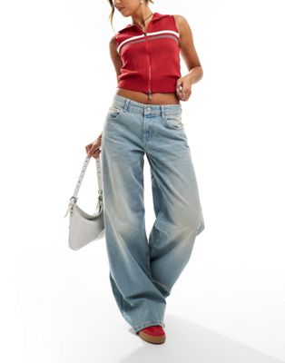 wide leg baggy jeans in dirty mid blue wash