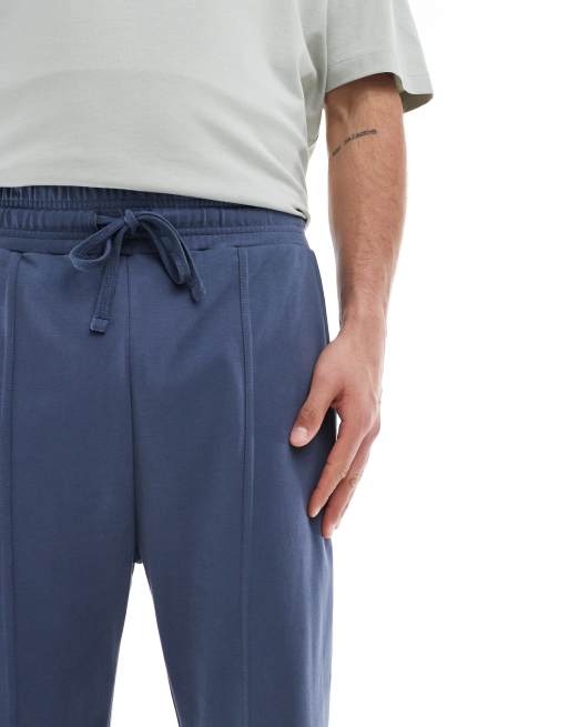 Bershka wide leg jogger in dark blue ASOS - Main Image