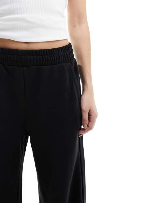Bershka wide leg joggers in black