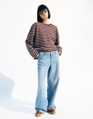 Bershka wide leg low waist jeans in mid blue | ASOS