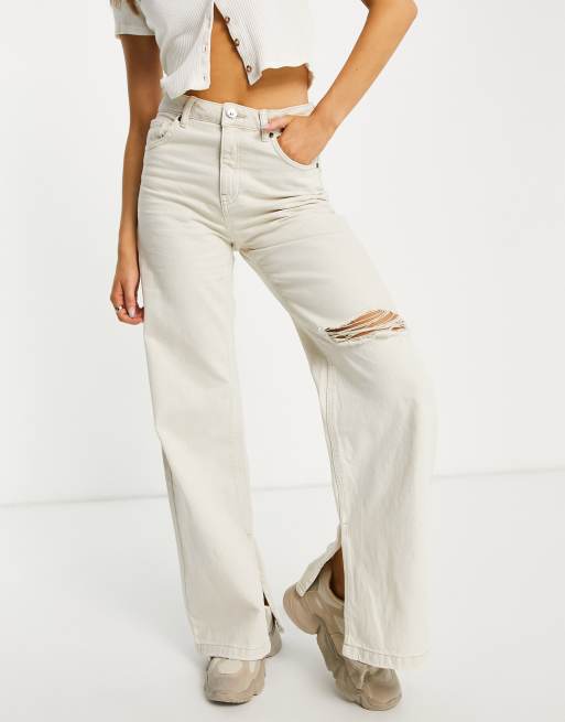 Bershka wide leg trouser with knee rip in beige | ASOS