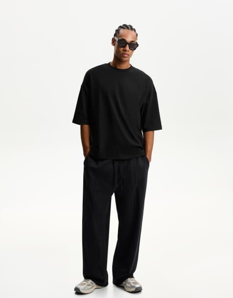 Bershka wide leg trousers in black - view 1