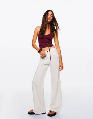 Bershka wide leg trousers in white - view 1