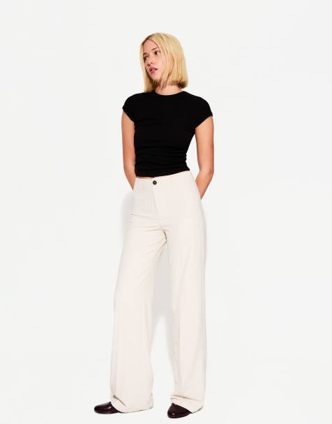 Bershka wide leg trousers in white