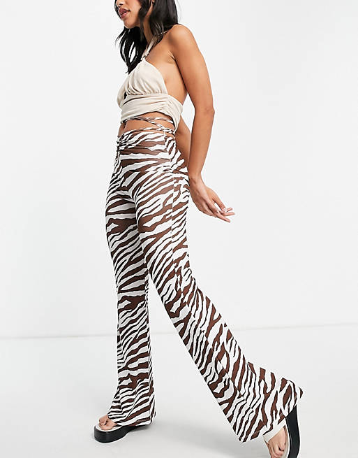 Bershka wide leg zebra print trouser with strap detail in brown