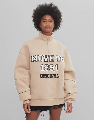 beige zip up sweater