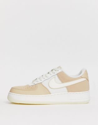 white and beige air force 1