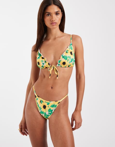 Bikini de braguitas brasileñas y top triangular con estampado de girasoles, lazada delantera y ribete de volantes de Vero Moda - view 1