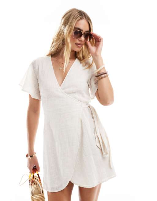 Billabong – All For You – Biała sukienka kopertowa mini, z dekoltem w kształcie litery V
