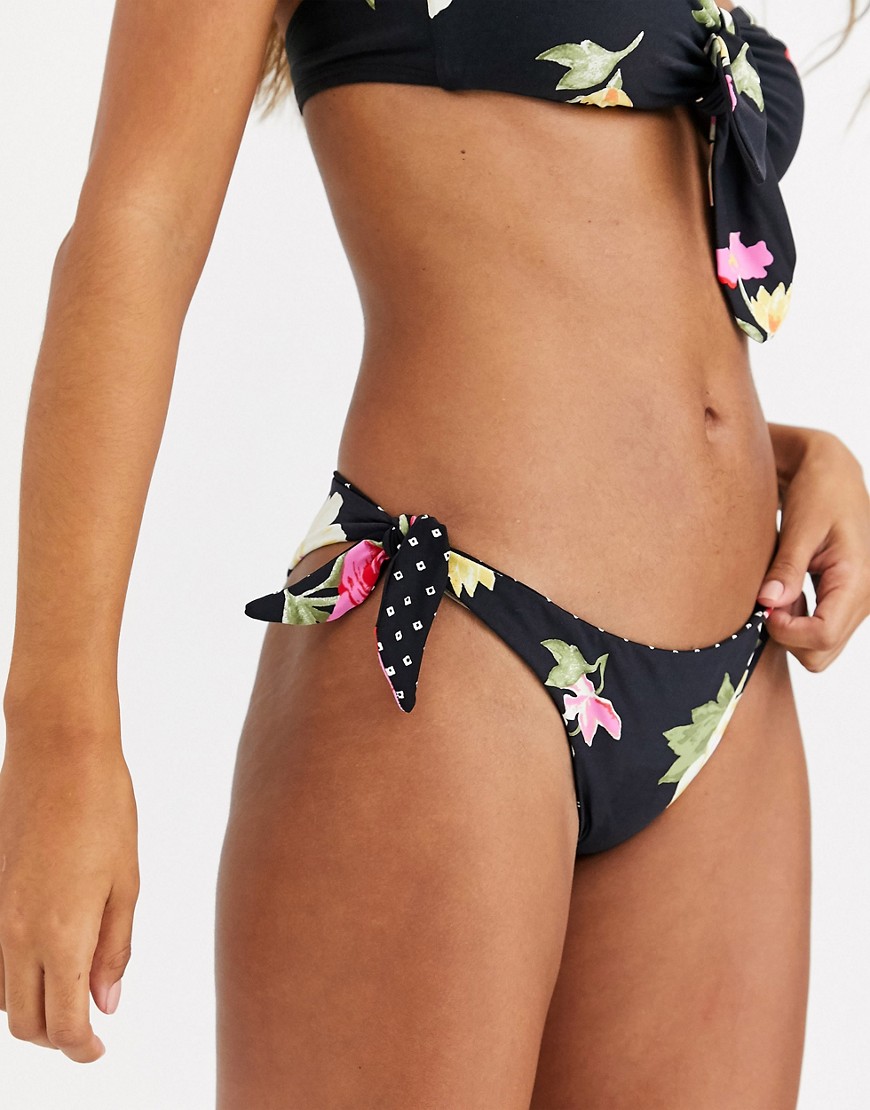 Billabong – Lost Light – Svart blommig bikiniunderdel i vändbar design med knytning i sidan-Flerfärgad