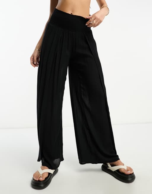 Billabong Wandering Soul high waist beach pants in black | ASOS