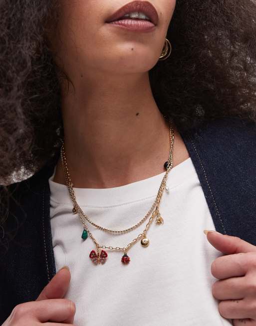 BIMBA Y LOLA - Ketting met gemengde hangertjes in goud