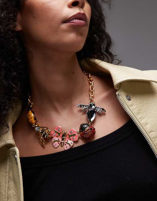 BIMBA Y LOLA - Ketting met insecthangertjes in goud