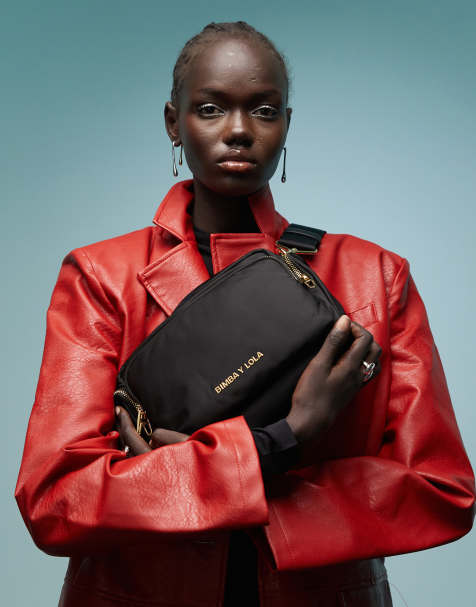 BIMBA Y LOLA medium nylon pouch crossbody bag in black - view 1