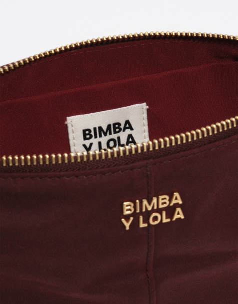 Bimba Y Lola neceser mediano revestido trapezoidal en color vino - view 1
