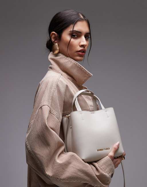 BIMBA Y LOLA piccola borsa Chihuahua in pelle color stone, 1 di 4