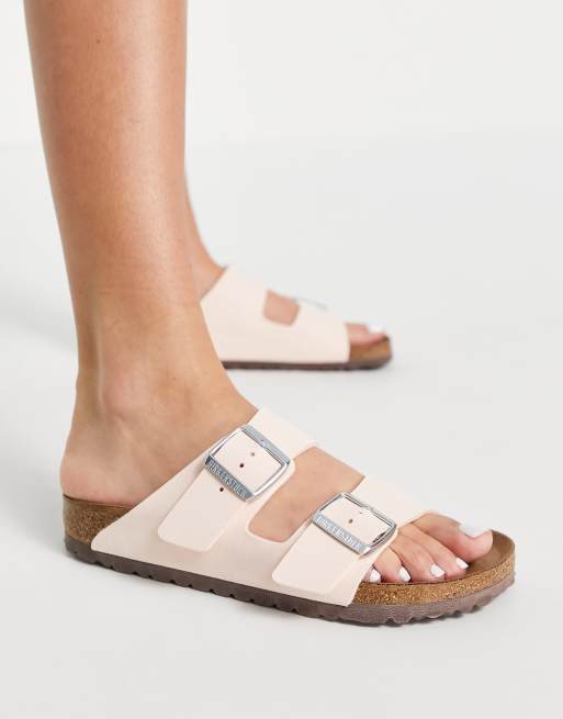 Birkenstock Arizona Sandales plates en imitation cuir Rose p le