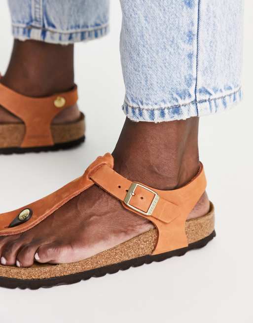 Birkenstock Kairo Flache Sandalen aus weichem Nubuk in Pekannussbraun