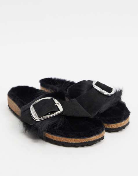 Birkenstock – Madrid – Schwarze Fell-Slipper mit großer Schnalle