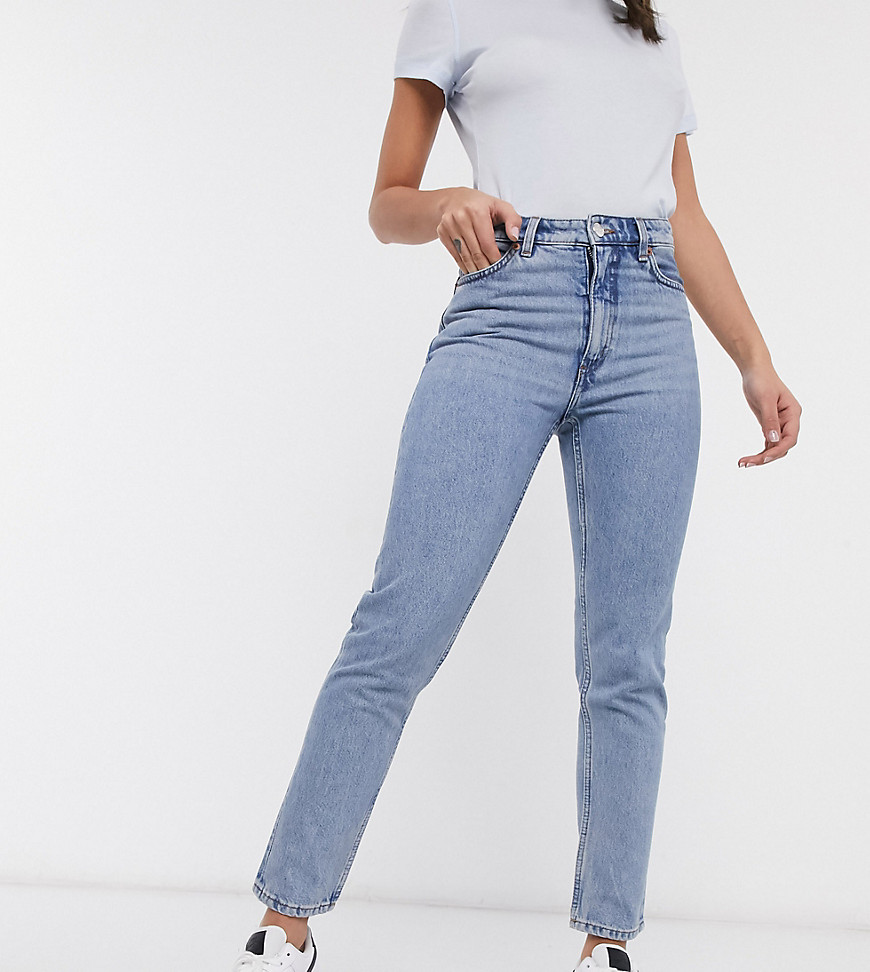 Blå, højtaljede 80'er jeans i økologisk bomuld fra Monki Kimomo