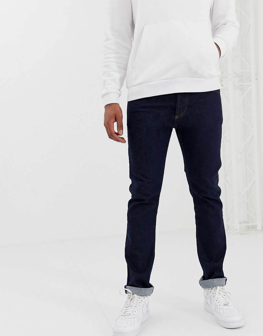 Blå skinny jeans med logo bagpå fra Versace Jeans