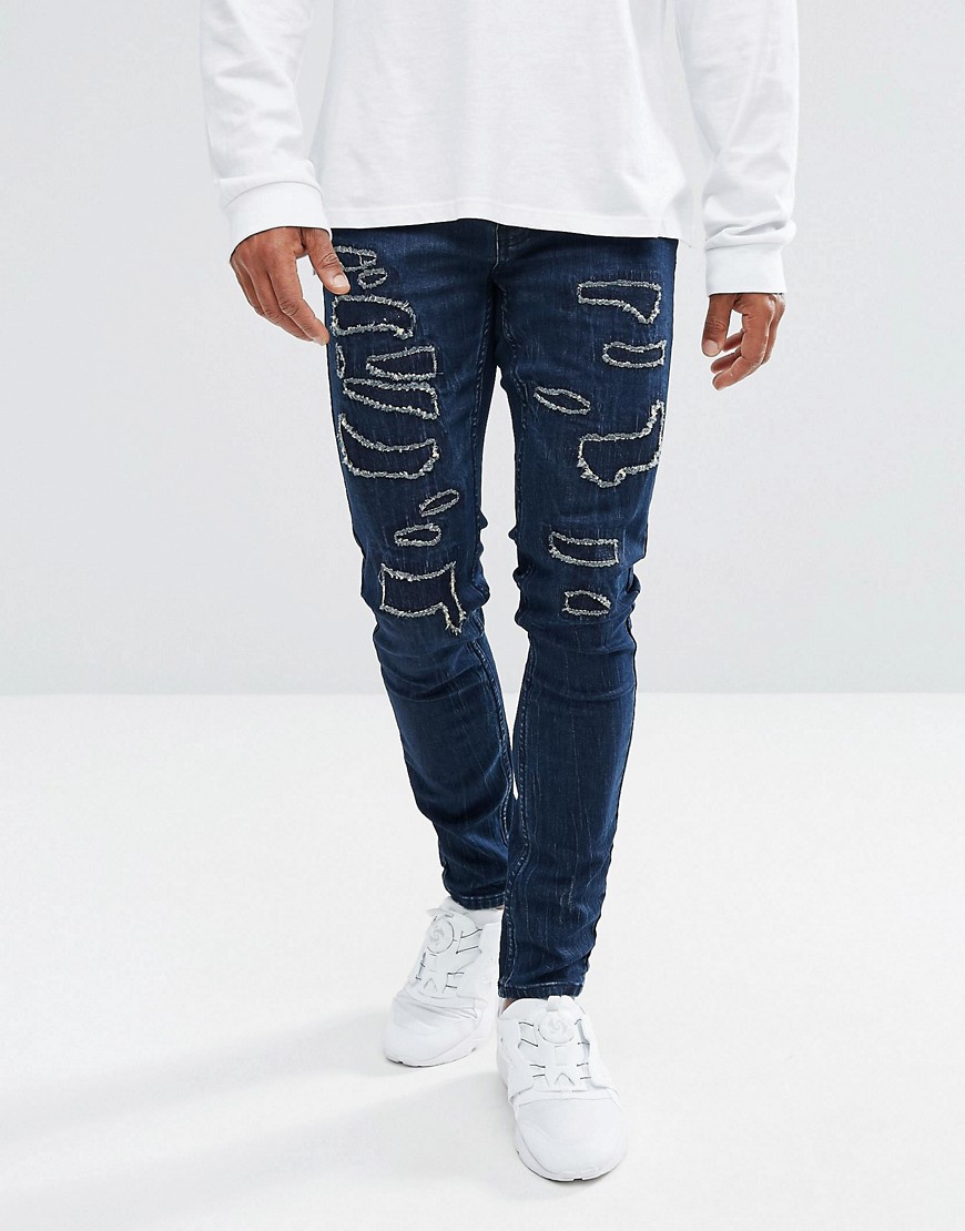 Black Kaviar - Skinny jeans met slijtplekken in donkerblauw