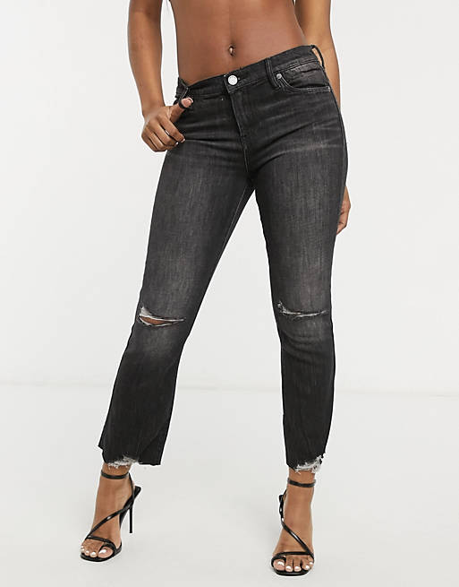 Blank NYC distressed knee kick flare jeans in washed black