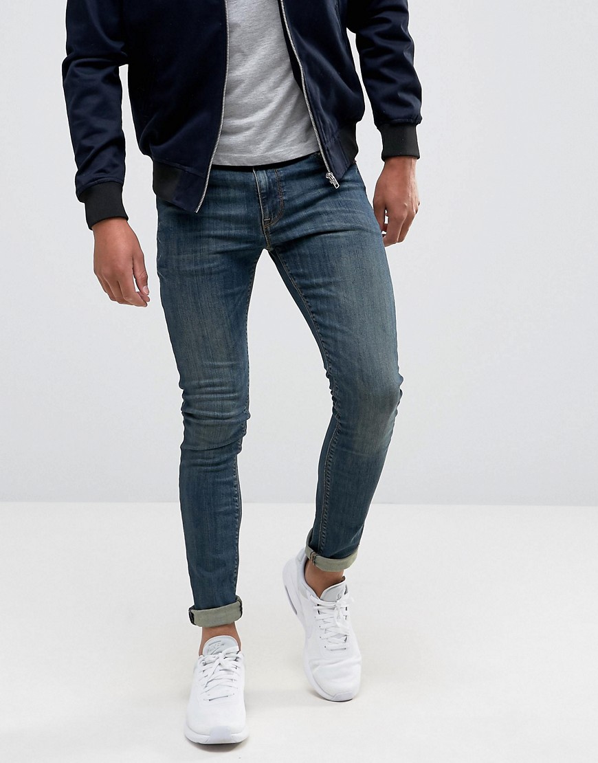Blåvaskede super-skinny jeans fra ASOS DESIGN