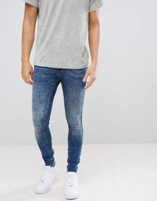 flurry distressed muscle fit jeans in authentic wash-Blue