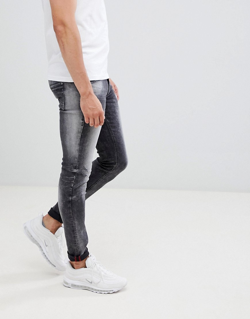 Blend – Svarttvättade superskinny jeans med slitna partier